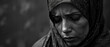 The silent eloquence of a Muslim woman crying visualized with the deep empathy and nuance of documentary photography