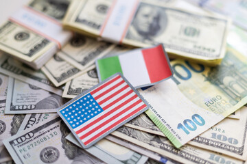 Wall Mural - Flag of Italy sticking in a variety of american banknotes.(series)