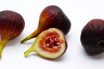 Wall Mural - Fresh figs on white background.