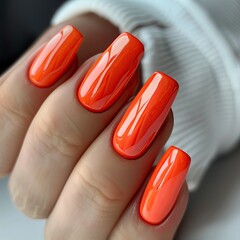 Wall Mural - Female hand with orange nail design. Red nail polish manicure.