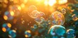 Colorful soap bubbles floating in the air with a radiant sun shining in the background