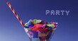 Image of party text over party confetti in cocktail glass in background