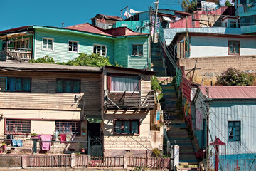 Valparaiso cityscape, colorful houses in Valparaiso, Chile. Old house with a spire against blue sky