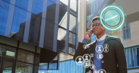 Poster - Image of clock moving over biracial businessman talking on smartphone