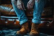 Highly detailed capture focusing on the textures of well-used leather boots and torn jeans, conveying a sense of rugged individualism