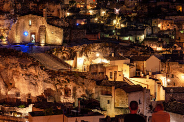 Wall Mural - Matera, Matera district, Basilicata, Italy, view of Sasso Caveoso with the rock church of Santa Maria De Idris on the left