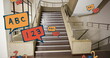 Image of school items icons moving over stairs