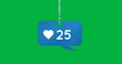Digital image of a heart icon and numbers increasing inside a tied blue chat box in a green backgrou