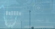 Image of graphs moving over wind turbines against pump jack at oil industry