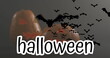 Halloween text banner and multiple flying bat icons over halloween pumpkins against grey background