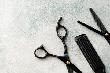 Hairdressing tools set on light gray background