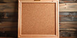 © Planetz - A blank empty frame on dark wooden  background, cork board frame
