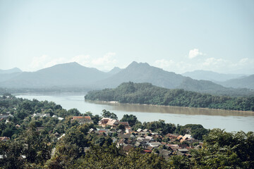 Wall Mural - My journey through Laos with the Mekong River as a travel buddy