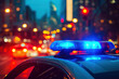 Blue and red light flasher atop of a police car. City lights on the background