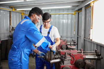 Poster - factory workers or technicians working and control lathe machine in factory