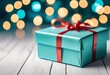 Christmas or birthday gift box on white wooden table against blue turquoise bokeh lights. Holiday greeting card concept
