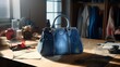 Handbags Made from Old Jeans on a Dressmaker Table

