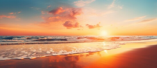 Poster - Serene Beach Landscape Silhouetted Against a Glowing Sunset Sky