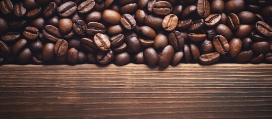 Poster - Rich Aroma: Scattered Coffee Beans on Rustic Wooden Surface - Artisanal Roasting Concept