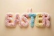 Colorful Easter Sign Created With Fluffy Letters and Bunny Ears on a Yellow Background