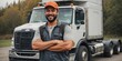 © Maryna Andriianova - Young male truck driver standing in front of his truck