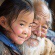 © StasySin - A young girl and an elderly man sharing a joyful moment