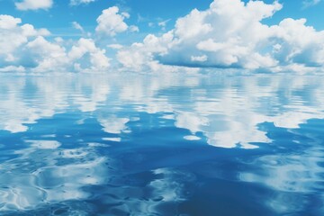 Aufkleber - A serene view of a large body of water with clouds in the sky. Perfect for nature and travel concepts