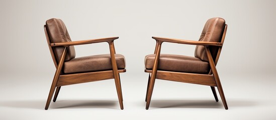 Poster - Two brown leather chairs, made of hardwood stained wood, sit next to each other on a white rectangular outdoor furniture surface for comfort