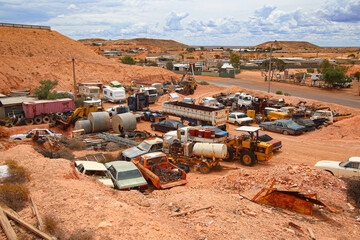 Wall Mural - Junkyard of rusty abandoned vintage cars in the desert of the Australian outback of the red center in the opal mining town of Coober Pedy, South Australia