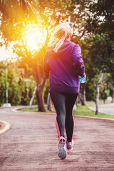 Wall Mural - woman running, training and jogging in summer park