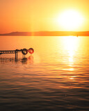 Fototapeta Uliczki - Amazing sunset over lake Balaton in summer