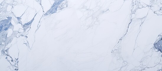 Poster - A close up of a white marble texture resembling snowcovered slopes with blue veins, creating an icy cap effect, reminiscent of freezing winter events