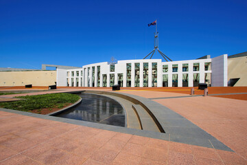 Shallow circular pond in front of the Parliament House of Australia on Capital Hill in Canberra, Australian Capital Territory