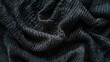 Detailed close-up of black knit fabric. Ideal for fashion or textile backgrounds