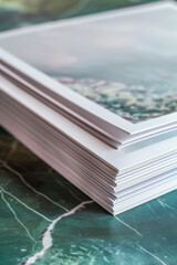 Poster - A stack of books on a table, perfect for educational or reading concepts