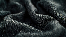 A Detailed Image Of A Black Cloth. Suitable For Backgrounds Or Textures