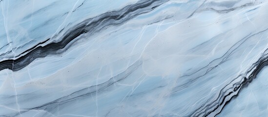 Canvas Print - A detailed shot of a frozen slope resembling a blue and white marble pattern created by wind waves in an icy landscape, with hints of electric blue in the ice cap