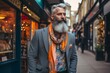 Portrait of a handsome bearded man with long gray beard and mustache in an orange scarf on the streets of London