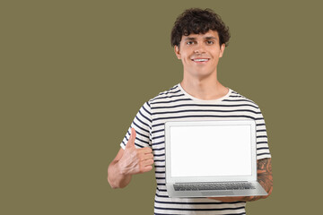 Poster - Male programmer with blank laptop showing thumb-up on green background