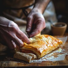 Cook Wrapping A Puff Pastry In A Salmon To Prepare A Dish, Soft Light, Morning Light