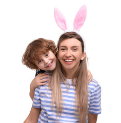 Wall Mural - Easter celebration. Mother and her cute little son with bunny ears isolated on white