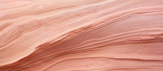 Poster - A close up of a hardwood board stained with shades of peach and liver, revealing a beautiful wave pattern resembling a landscape formation