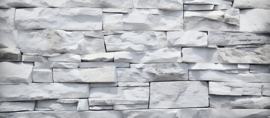 Poster - A detailed close up of a grey brick wall featuring a rectangular pattern. This monochrome photography showcases the building materials texture