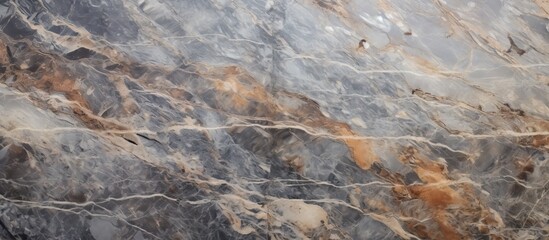 Sticker - A detailed closeup of a marble surface with a textured pattern of gray and brown, resembling a natural landscape with elements like rocks and bedrock