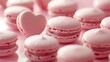 A tempting display of luxury—a collection of pink, heart-shaped macarons. HD captures the delectable elegance in intricate detail.