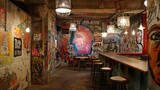 Fototapeta Młodzieżowe - A graffiti-covered interior space featuring walls adorned with graffiti art. The space includes hanging ceiling lights, cracked walls, and an urban style.