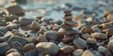 Fototapeta Londyn - Stack of rocks on beach