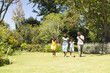 © Wavebreak Media - African American family enjoys a sunny day outdoors with copy space