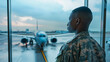 A soldier standing inside an airport terminal waiting for flight ,deployment refers to activities required to move military personnel and materials from a home installation to a specified destination
