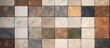The picture shows a variety of tiles including brown, grey, and beige hues in rectangular shapes. The flooring and wall tiles create symmetry with different tints and shades